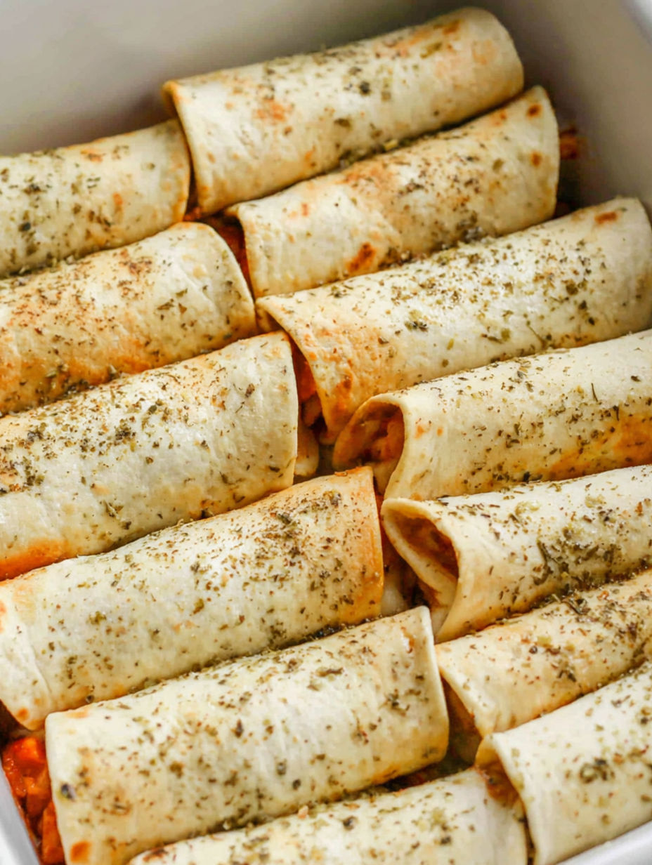 A pile of pizza roll ups.