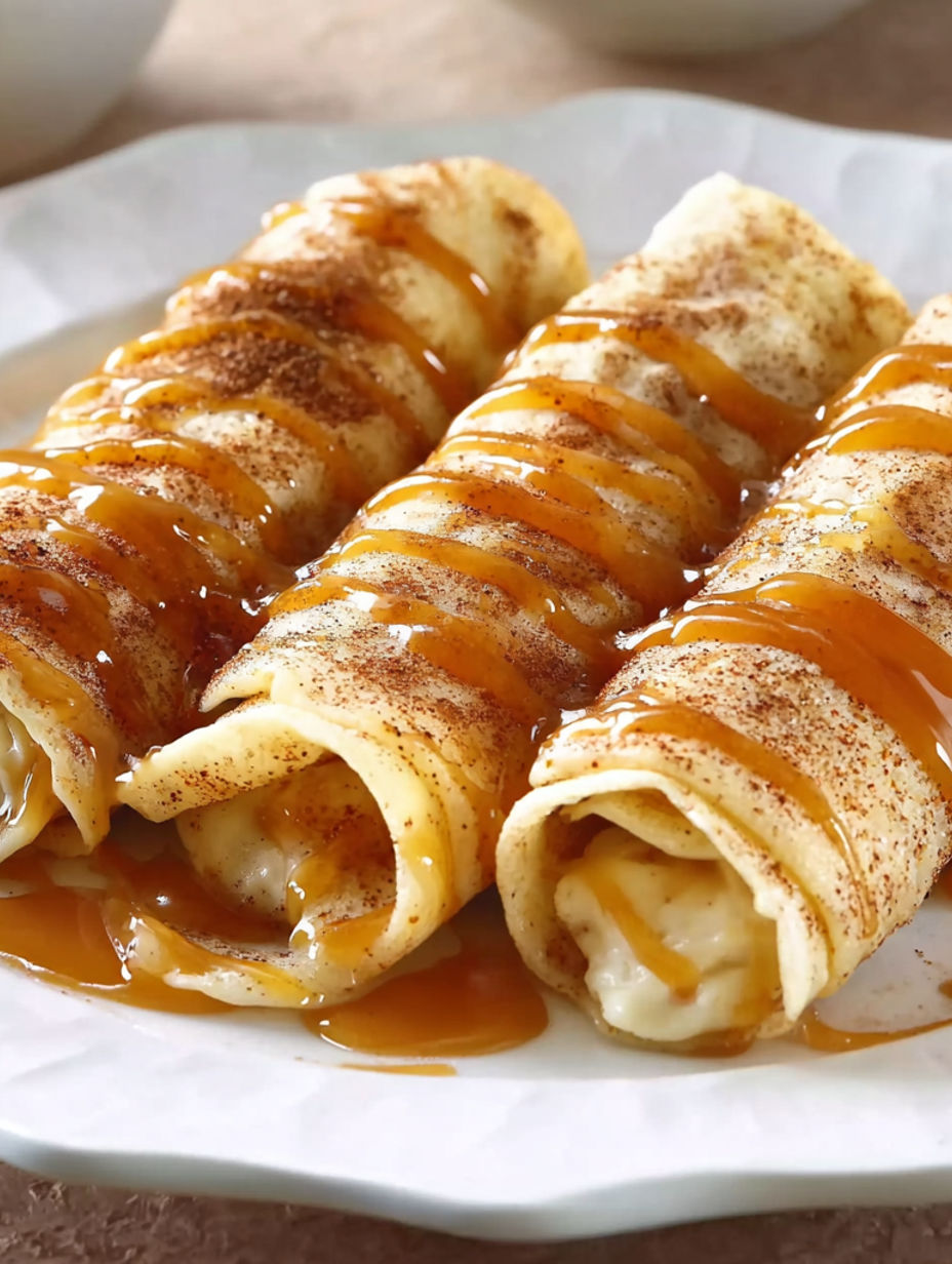 Apple pie enchiladas with caramel sauce.