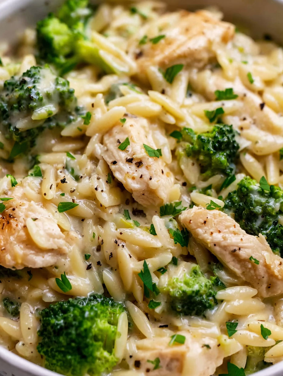 A dish of chicken and broccoli with rice.