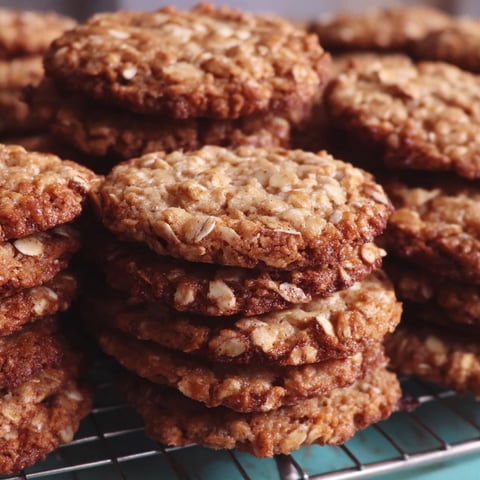 A tray of cookies with a nutty topping.