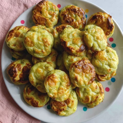 A plate of food with a yellow and green color.