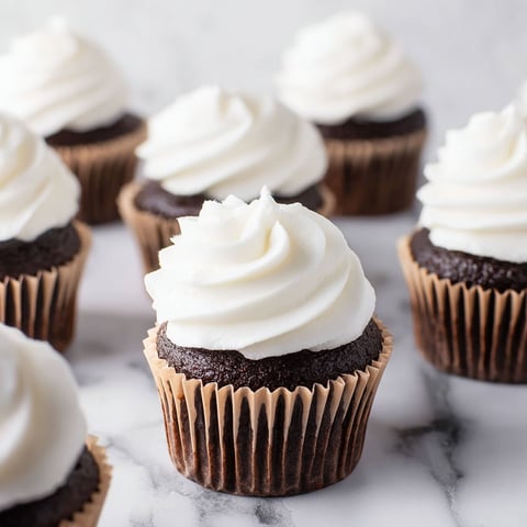 Marshmallow frosting on a cupcake.