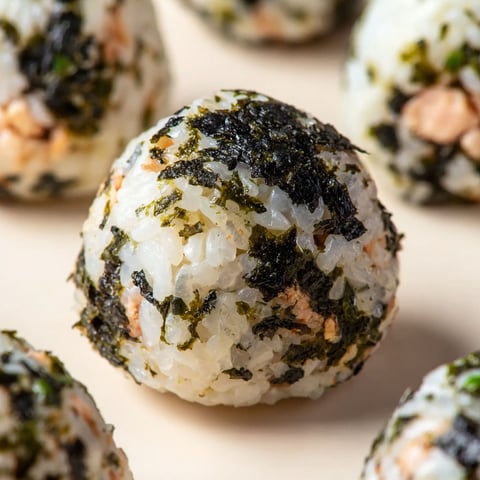 A close up of a tuna mayo rice ball.