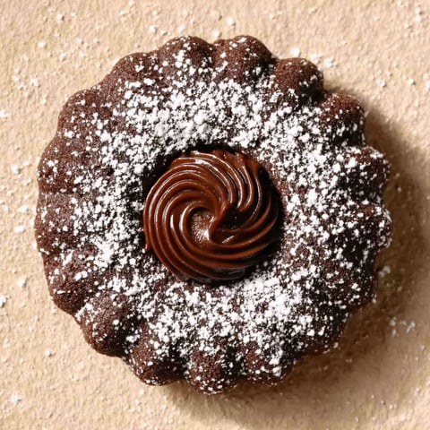 A chocolate-covered pastry with Nutella filling.