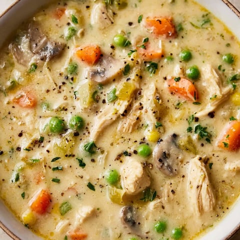 A bowl of chicken pot pie soup.