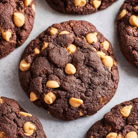 A close up of a chocolate peanut butter cookie.