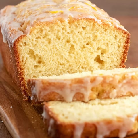 A slice of glazed sourdough lemon cake.
