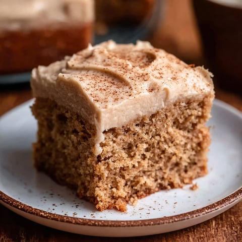 A slice of chai cake on a plate.